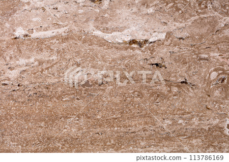 Travertine background in attractive brown tone, part of design. Travertine background in attractive brown tone, part of design. 113786169
