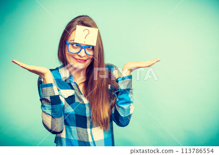 Thinking woman with big eyeglasses and light bulb Thinking woman with big eyeglasses and light bulb 113786554