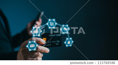 businessman showing a mock-up credit card for business and shopping to make payment and smartphone.half body. purchase, commerce, financial, card, money, using technology. selective focus. 113788586