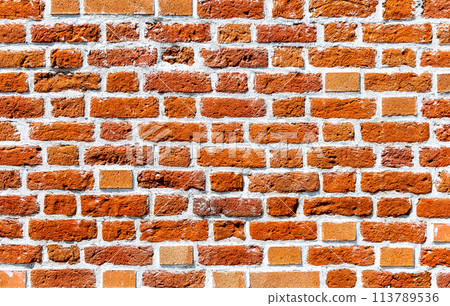 Old weathered red brick wall as background Old weathered red brick wall as background 113789536