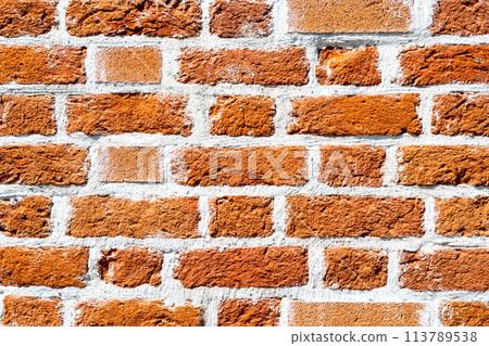 Old weathered red brick wall as background Old weathered red brick wall as background 113789538