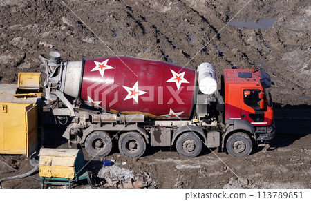 Kiev, Ukraine March 13, 2019:  Tractors and excavators work on the construction of the foundation zero cycle 113789851