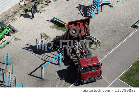 Kiev, Ukraine March 13, 2019: Tractors and excavators work on the construction of the foundation zero cycle Kiev, Ukraine March 13, 2019: Tractors and excavators work on the construction of the foundation zero cycle 113789852
