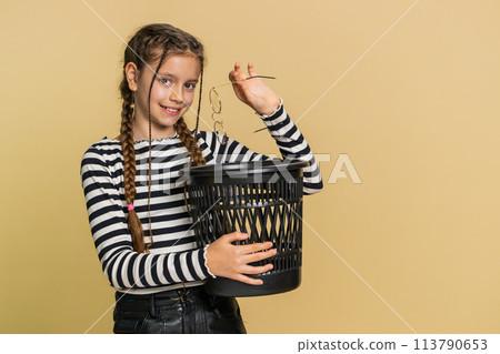 Child girl taking off throwing out glasses into bin, medical vision laser treatment therapy surgery 113790653