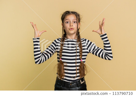 Excited amazed preteen child girl kid shocked surprised wow showing head brain explosion good news 113790710