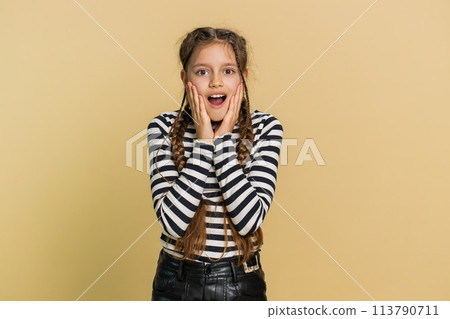 Excited child girl kid surprised, shocked by sudden victory, good win news celebrating, wow reaction 113790711
