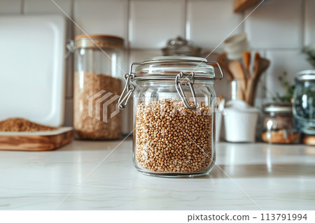 Buckwheat stored in a glass jar Buckwheat stored in a glass jar 113791994