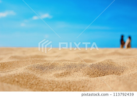 Footprints remaining on the beach 113792439