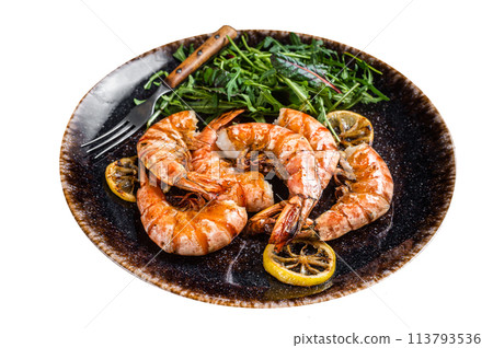 Spicy garlic Giant shrimps prawns in plate with salad. Isolated on white background. Top view. Spicy garlic Giant shrimps prawns in plate with salad. Isolated on white background. Top view. 113793536