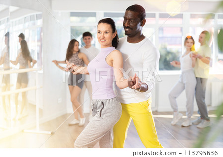 Couple adult woman and man dancing waltz 113795636