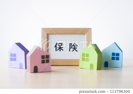 Insurance frame with colorful houses Insurance frame with colorful houses 113796300
