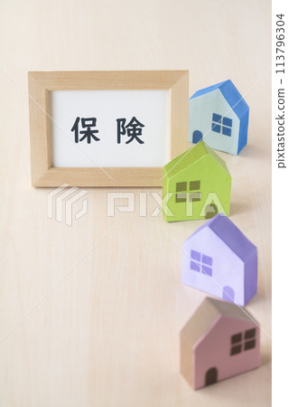 Insurance frame with colorful houses Insurance frame with colorful houses 113796304