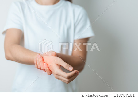 Woman having wrist pain at home, muscle ache due to De Quervain s tenosynovitis, ergonomic, Carpal Tunnel Syndrome or Office syndrome and Parkinson disease concept Woman having wrist pain at home, muscle ache due to De Quervain s tenosynovitis, ergonomic, Carpal Tunnel Syndrome or Office syndrome and Parkinson disease concept 113797191