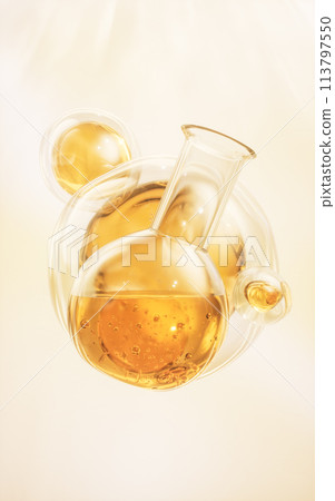 Chemical glassware with golden liquid, 3d rendering. 113797550