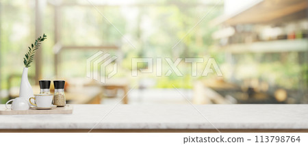 A luxury white marble kitchen tabletop in a contemporary spacious home kitchen. 113798764
