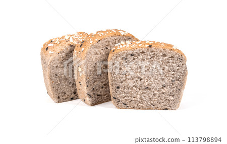 whole wheat breads sliced isolated on a white background whole wheat breads sliced isolated on a white background 113798894