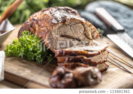 Juicy whole roasted neck on a cutting board Juicy whole roasted neck on a cutting board 113801361