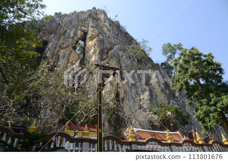 In front of the entrance to Tham Khao Yoi Temple. It is famous here. Located at Phetchaburi Province in Thailand. In front of the entrance to Tham Khao Yoi Temple. It is famous here. Located at Phetchaburi Province in Thailand. 113801676