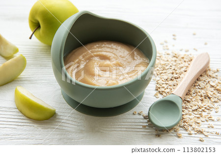 A bowl of porridge for baby. 113802153