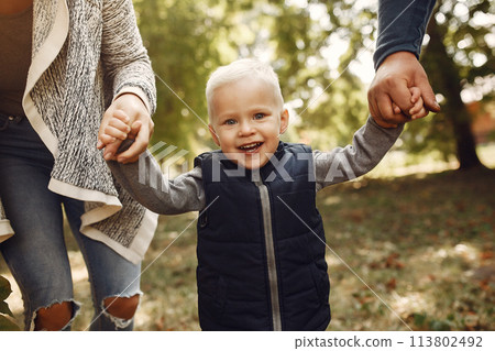 Family with little son in a autumn park 113802492