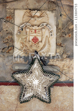 Christmas star above the entrance to the cave in Shepherd's Fields in Beit Sahour near Bethlehem, Israel 113804733