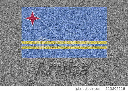 The Aruban flag painted on a stone slab with the word "Aruba" carved into it The Aruban flag painted on a stone slab with the word "Aruba" carved into it 113806216
