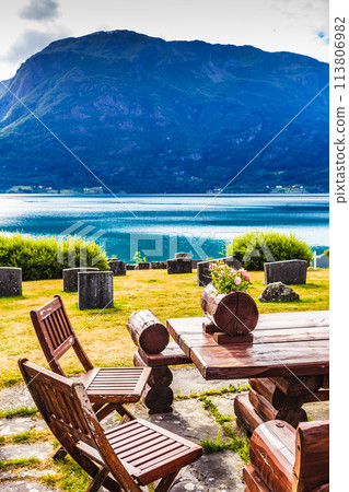 Churchyard in Nes village at fjord, Norway 113806982
