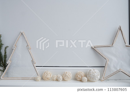 White empty vision board wall with cozy minimalistic handmade new year Christmas decor Low key festive. Copy space for your text, product mock up template White empty vision board wall with cozy minimalistic handmade new year Christmas decor Low key festive. Copy space for your text, product mock up template 113807605