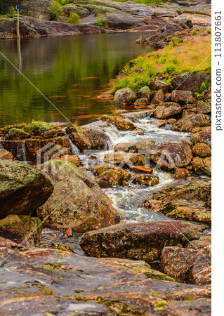 Little stream in mountains, Norway. 113807661