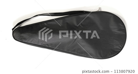 Old tennis racket cover isolated on white Old tennis racket cover isolated on white 113807920