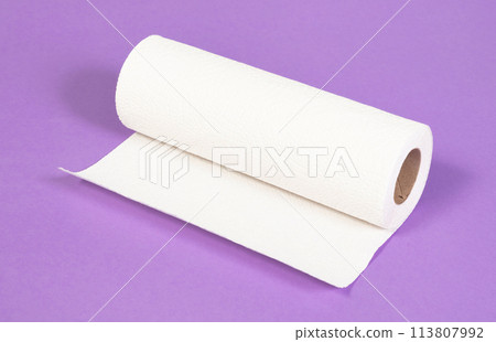 White kitchen paper isolated on purple background White kitchen paper isolated on purple background 113807992