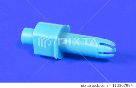 Old confectionery syringe isolated on solid background Old confectionery syringe isolated on solid background 113807994