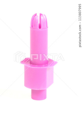 Old confectionery syringe isolated on solid background Old confectionery syringe isolated on solid background 113807995