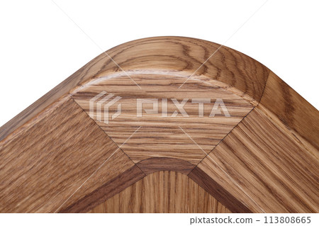 Closeup of wooden table top made of solid oak and veneer of marquetry technique on white background 113808665