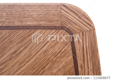 Closeup of wooden table top made of solid oak and veneer of marquetry technique on white background 113808677