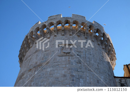 One of the towers in the ancient city wall of the historic city Korcula at the island Korcula in Croatia One of the towers in the ancient city wall of the historic city Korcula at the island Korcula in Croatia 113812150