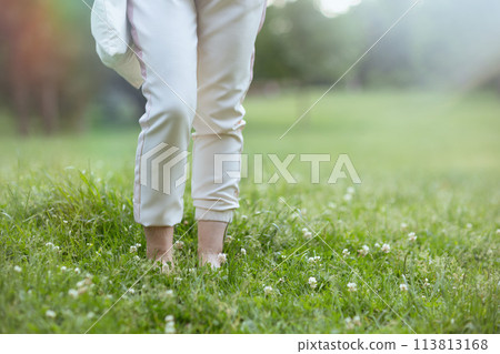 Closeup on female in white shirt Closeup on female in white shirt 113813168