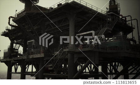 An oil rig in the middle of the ocean 113813655