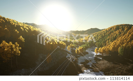 An aerial view of a road in the mountains. beautiful sunset An aerial view of a road in the mountains. beautiful sunset 113814114