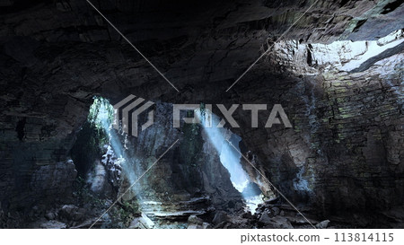 A cave filled with lots of rocks and water A cave filled with lots of rocks and water 113814115