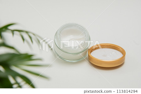 Skincare jar with cosmetic anti aging cream on white background 113814294