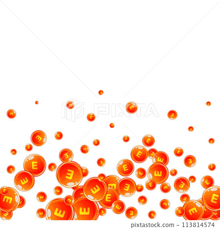 Vitamin E round capsules scattered randomly. 113814574