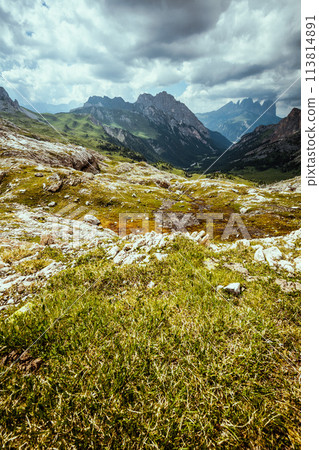 landscape with mountains, clouds and rocks 113814891