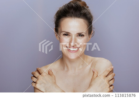 smiling modern female on blue 113815876