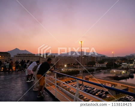 A ferry leaving Palermo port at dusk (Sicily, Italy) A ferry leaving Palermo port at dusk (Sicily, Italy) 113818425