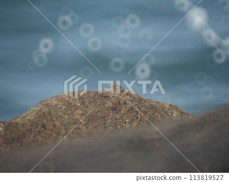 Coastal rocks and wave reflections Coastal rocks and wave reflections 113819527