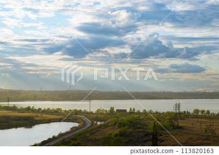 Top view of the picturesque natural and urban landscape at sunset Top view of the picturesque natural and urban landscape at sunset 113820163