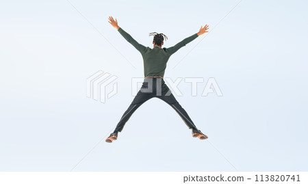 Full-body photo of a jumping black man from behind 113820741