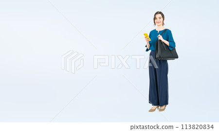 Full body photo of a white woman using a smartphone 113820834