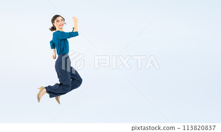 Full body photo of a white woman jumping Full body photo of a white woman jumping 113820837